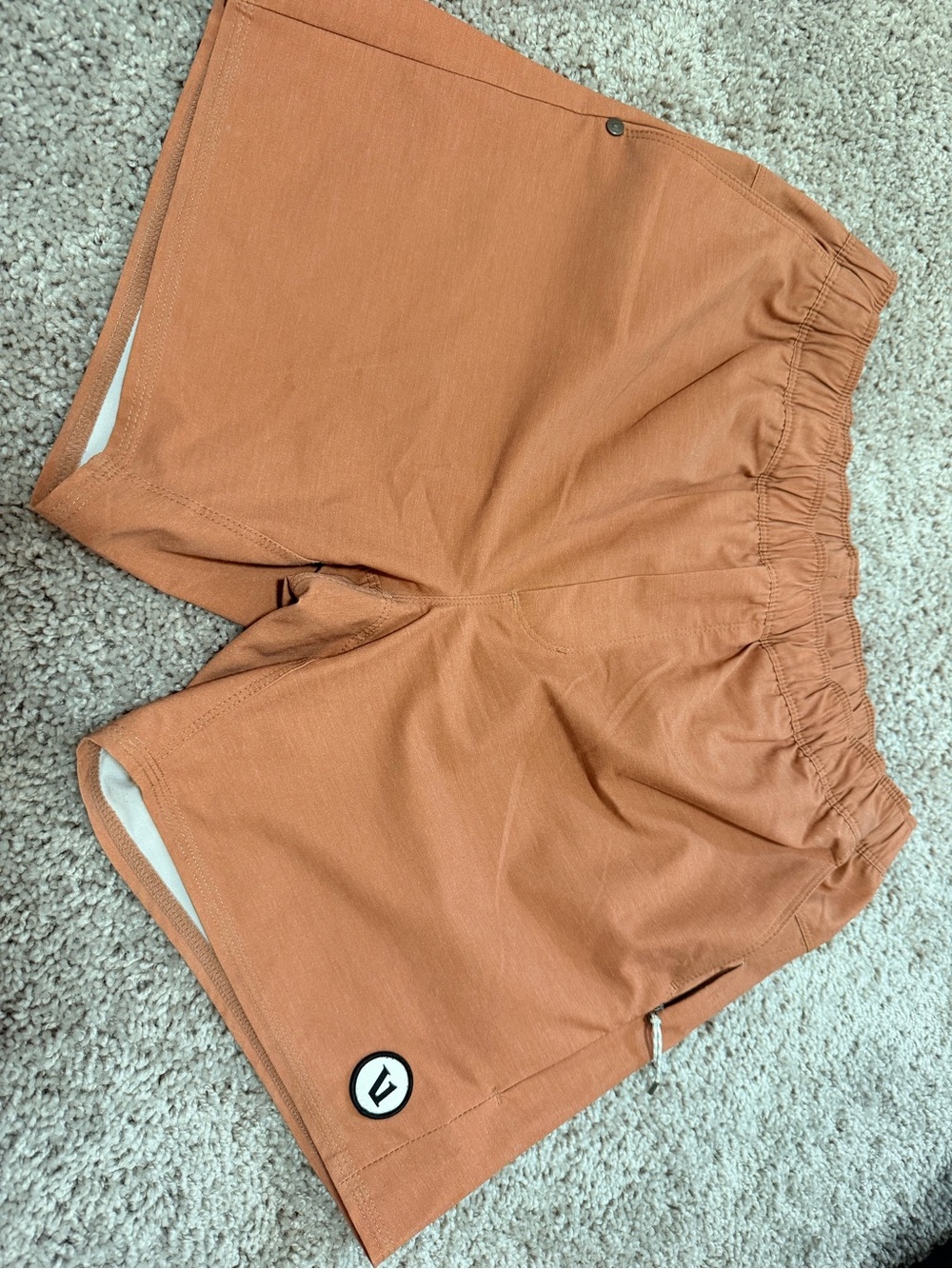 Vuori Men’s Rust Orange Athletic Shorts